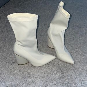 White heeled booties